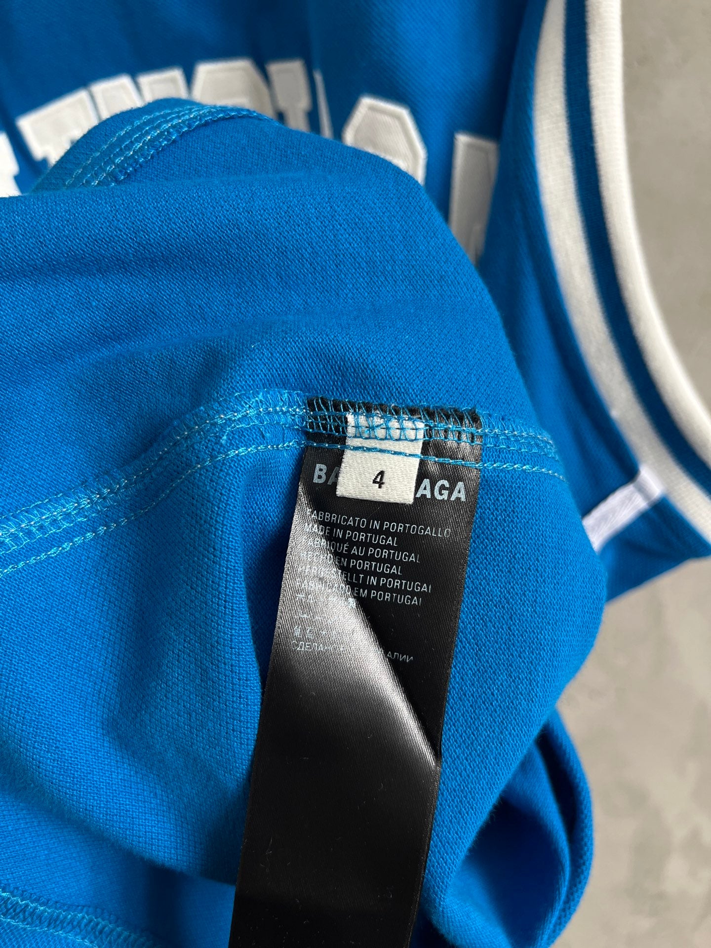 Balenciaga fabric label on blue sleeveless jersey