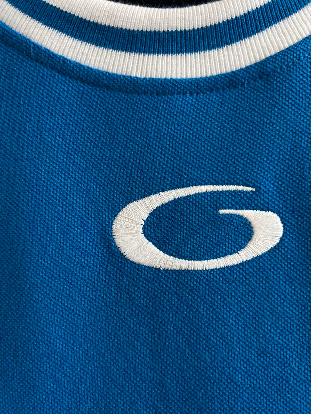 Balenciaga G logo on blue knit sleeveless top