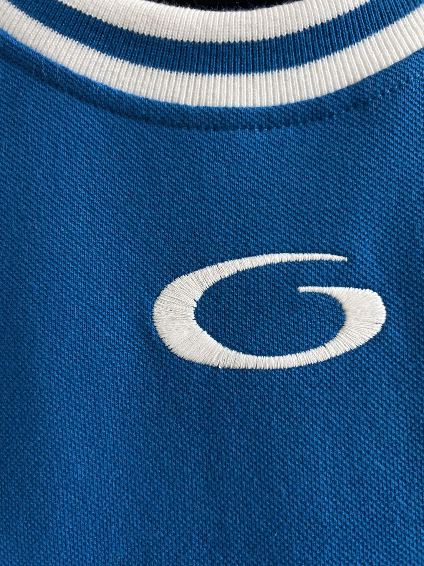 Balenciaga G logo on blue knit sleeveless top