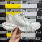 Balenciaga unisex white lace-up sneaker with chunky sole and detailed side panels