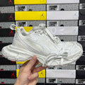 Balenciaga unisex sneaker in white with lace-up front and chunky textured sole