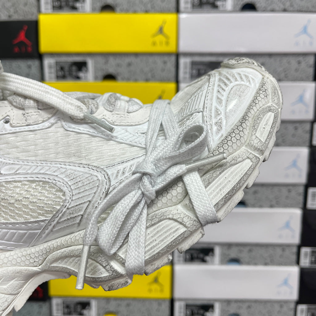 Balenciaga unisex sneaker side view in white with laces and sculpted sole