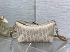 Dior monogram canvas shoulder bag with adjustable strap and zipper top, gold hardware