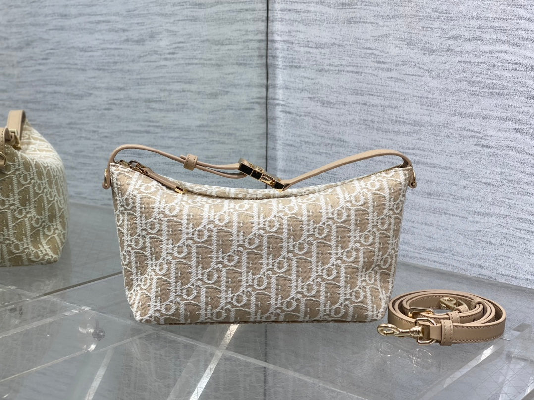 Beige Dior monogram crossbody bag with top handle and detachable strap, gold hardware