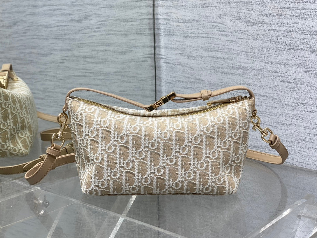 Dior monogram crossbody bag with two shoulder straps and gold-tone hardware