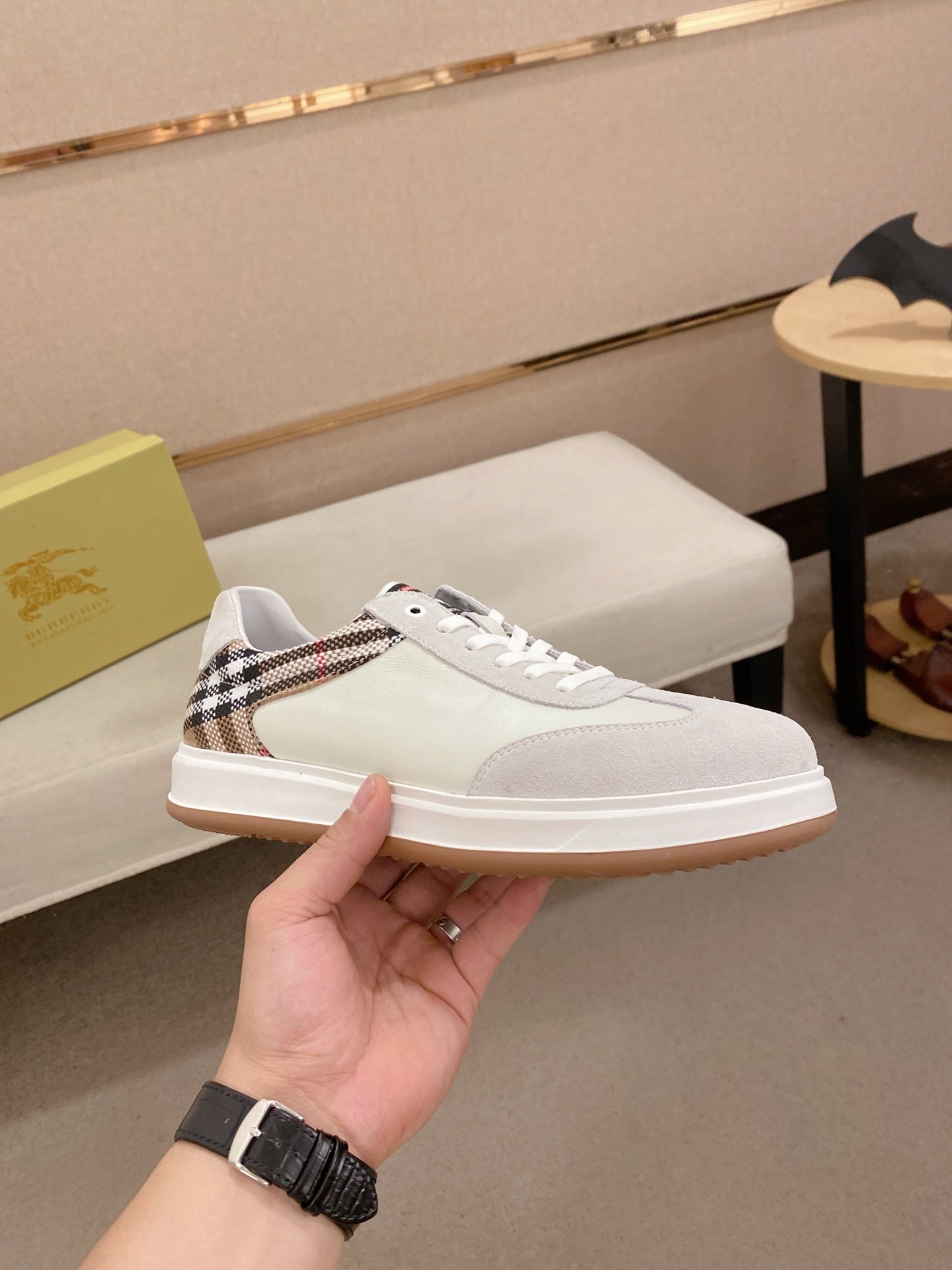 White leather sneakers with plaid check tongue panel and lace-up closure