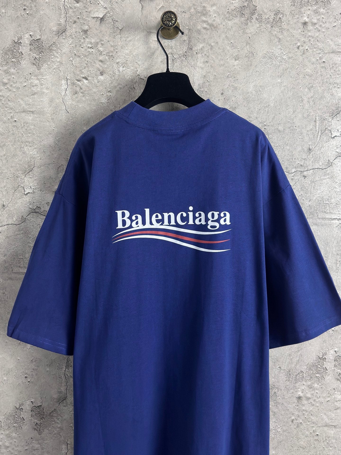 Blue Balenciaga crew-neck T-shirt with short sleeves and centered back logo print.