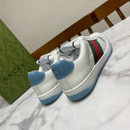 Gucci unisex sneakers heel view with white leather, blue sole, and green-red stripe