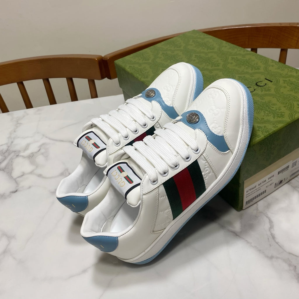Gucci unisex sneakers front view, white with blue sole and green-red stripe accents