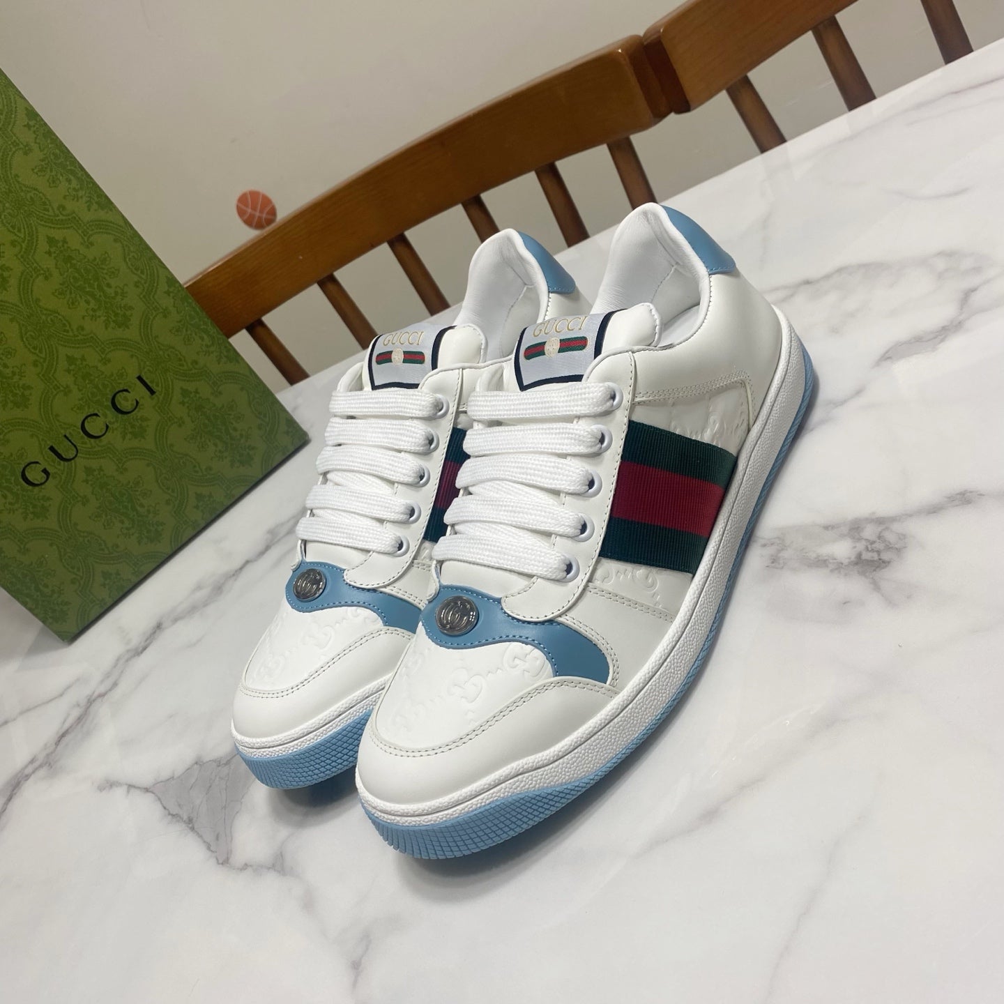 Gucci unisex sneakers in white with blue sole and green-red side stripe detail