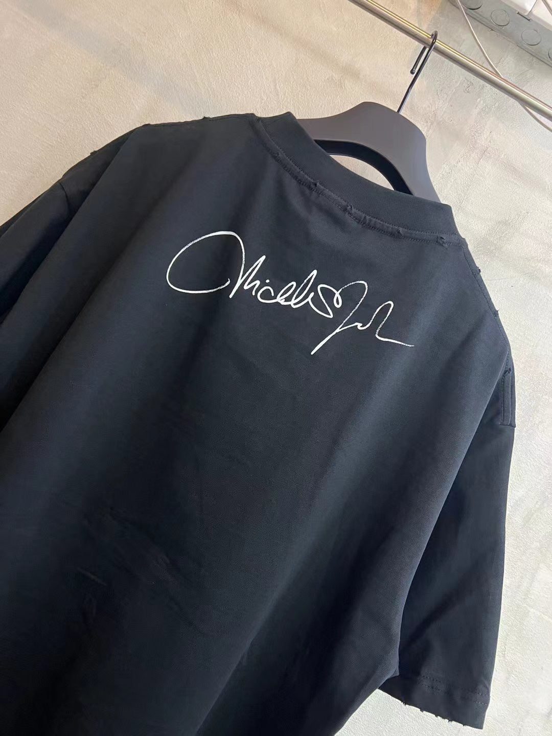 Balenciaga black T-shirt with script logo print on the upper back