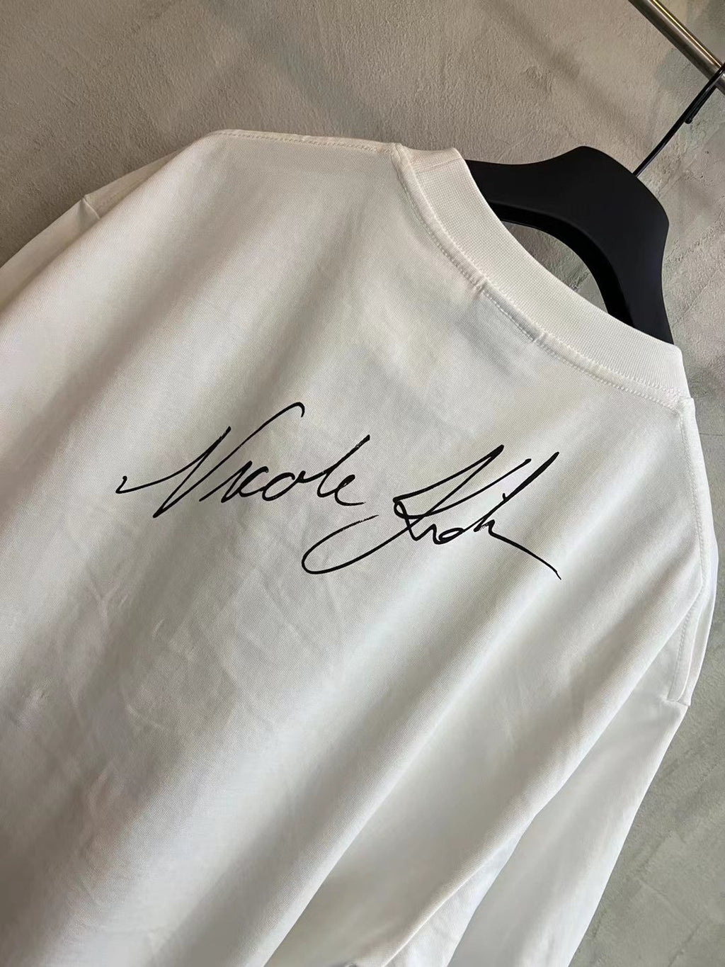 White Balenciaga T-shirt back with Nicole signature-style print near collar