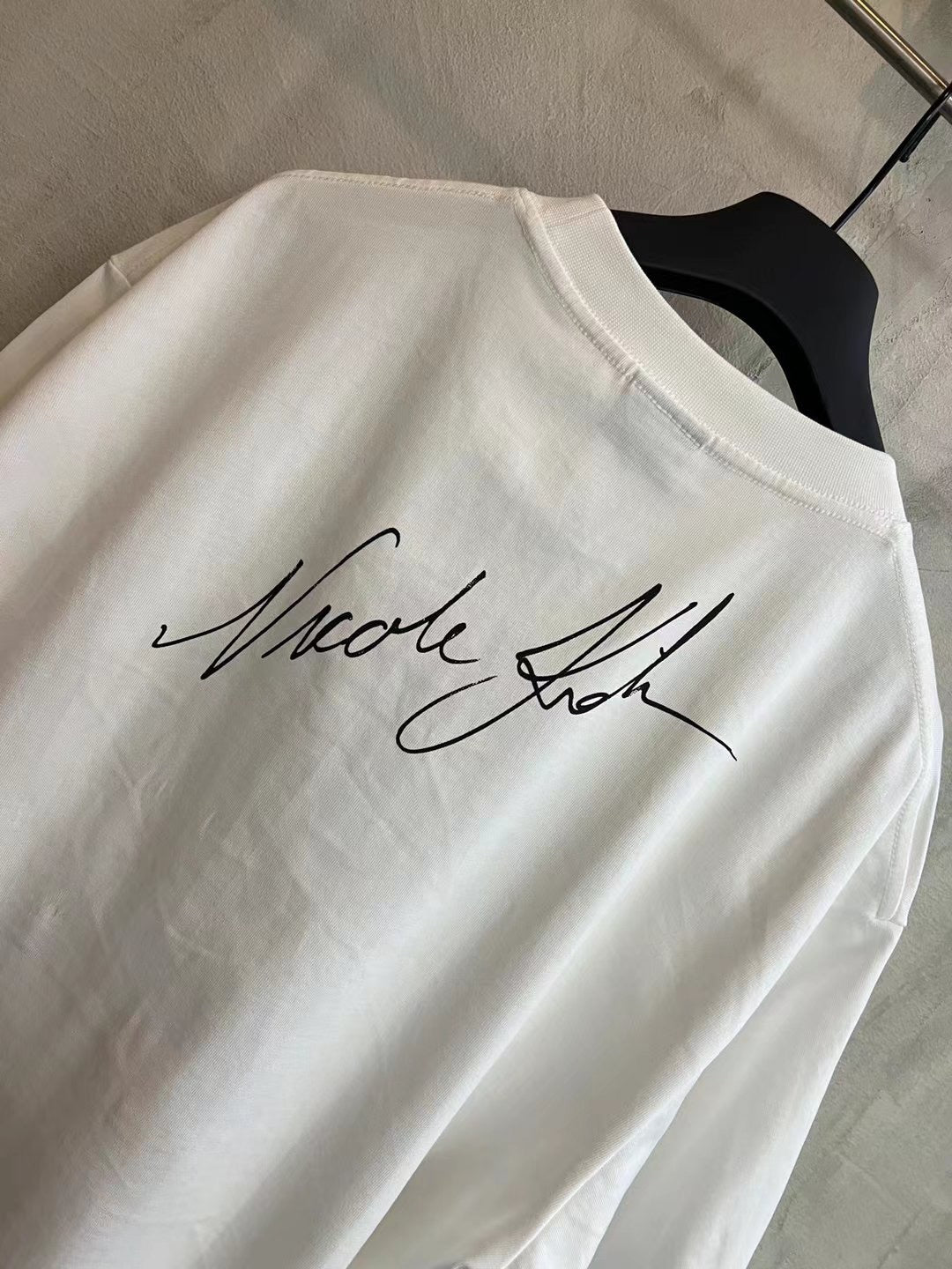White Balenciaga T-shirt back with Nicole signature-style print near collar