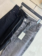 Wide-leg jeans in dark and light washes, front pockets and button closures visible.
