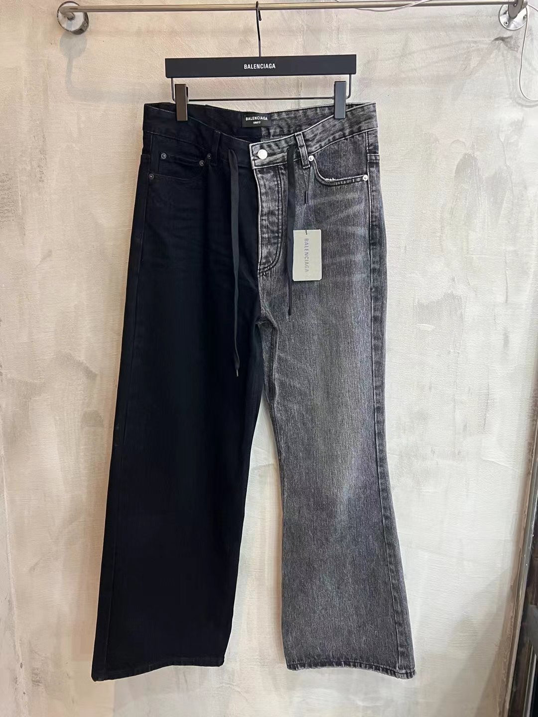 Denim pants with button fly, belt loops, black wash, wide leg.