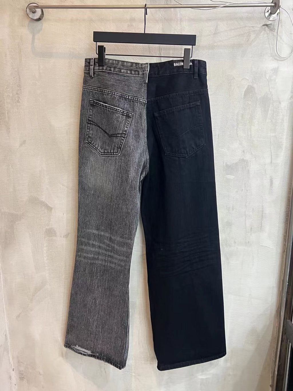 Denim pants with button fly, belt loops, dark navy wash, wide cropped leg.