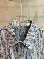 Blue-and-white patterned long-sleeve shirt collar with top button and placket