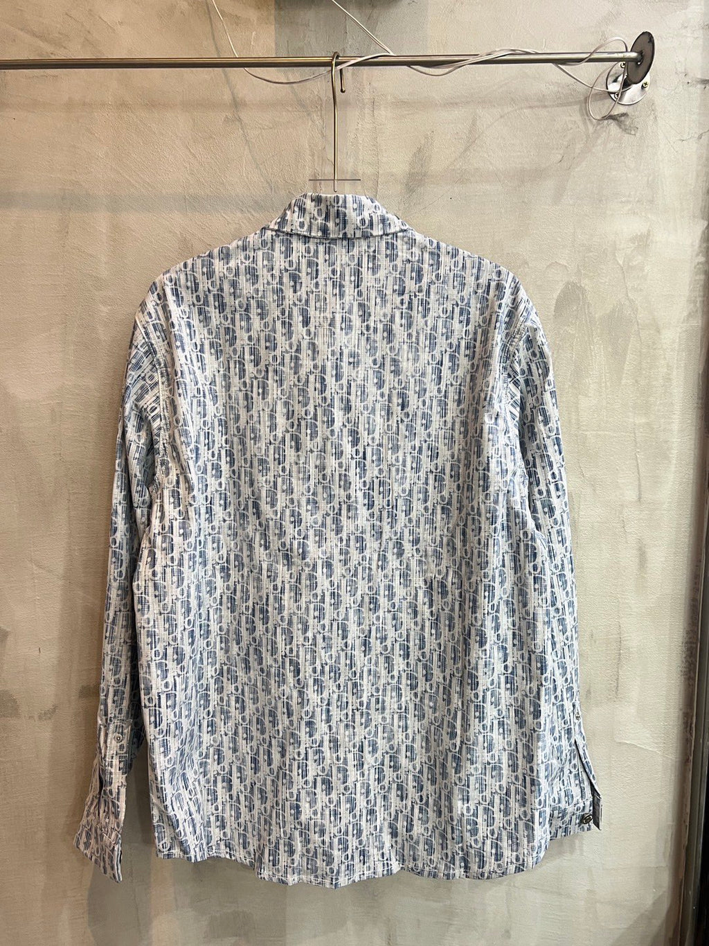 Light blue patterned long-sleeve shirt back view with yoke and full-length sleeves