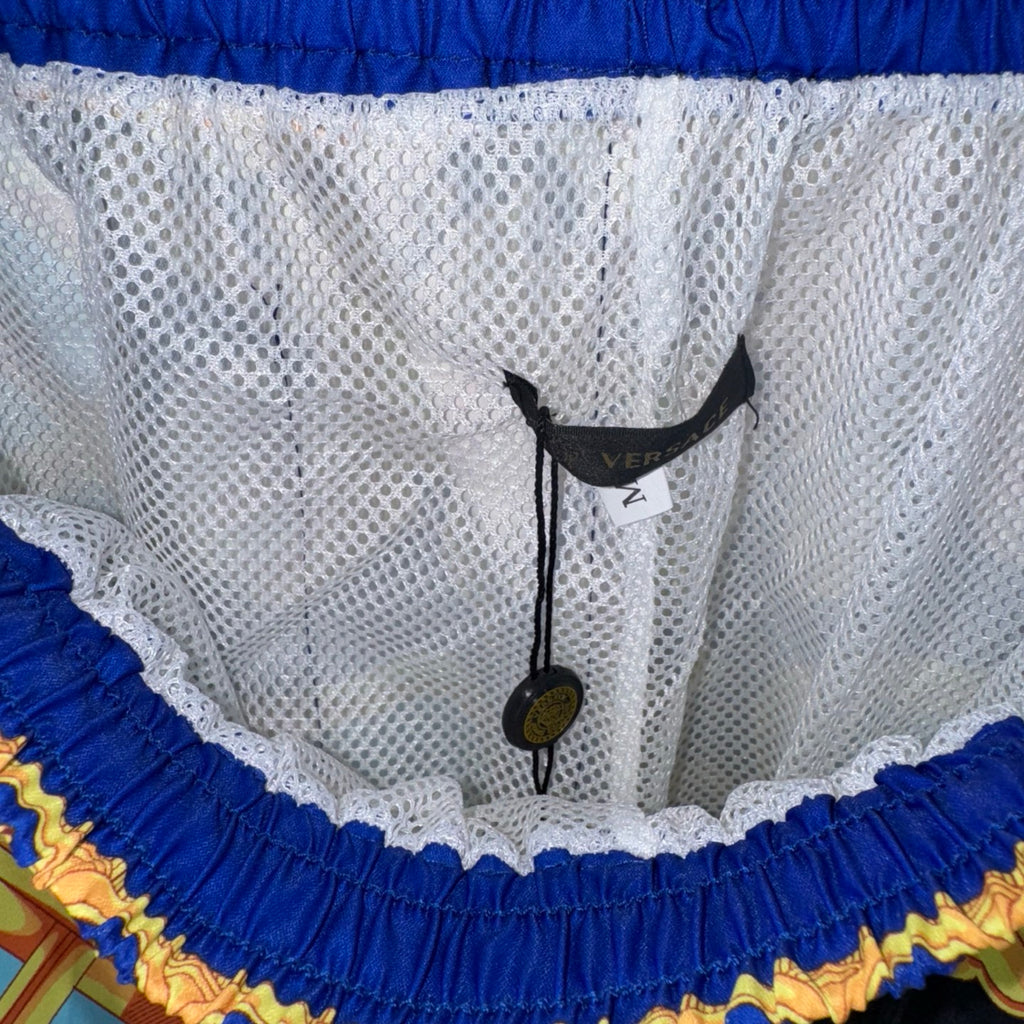 Versace sheer shorts interior with blue elastic waistband and size tag at front