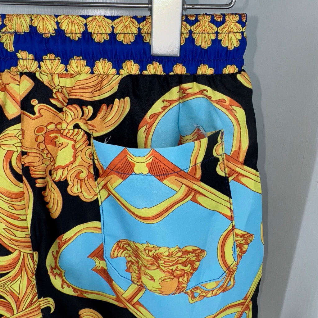 Versace baroque print shorts with light-blue front panel and black gold motifs