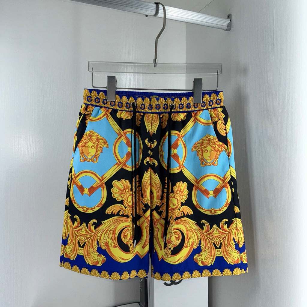 Versace shorts with bold black, blue and gold baroque medallion print, drawstring waist