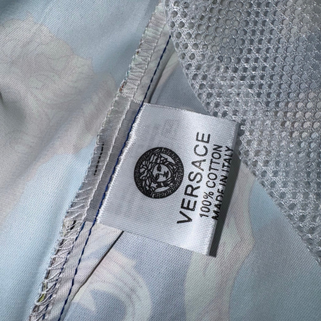 Versace inner fabric label on sheer shorts, white mesh with stitched trim