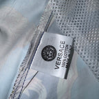 Versace inner fabric label on sheer shorts, white mesh with stitched trim