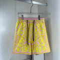 Versace shorts in yellow and pink baroque print, elastic waistband with black drawstring.