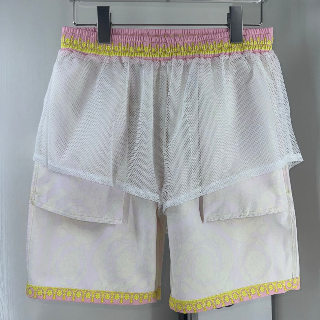 Versace white shorts with layered mesh overlay and ruffled elastic waistband.