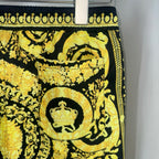 Versace skirt front with black-and-gold baroque medallion and floral scrolls