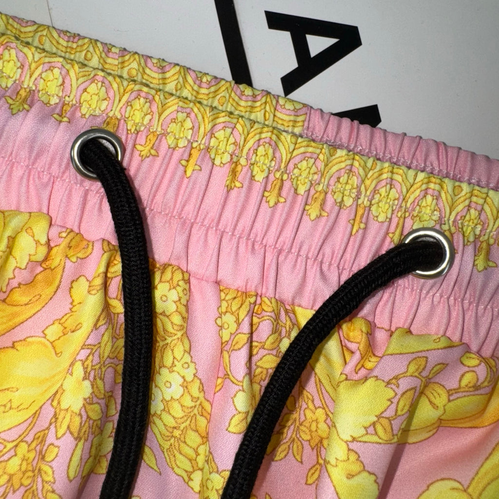 Versace printed shorts with pink elastic waistband and black drawstring eyelets