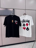 Black short-sleeve T-shirt with chest graphic of playing cards on hanger