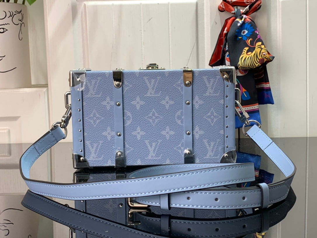 Men's Louis Vuitton trunk bag, light blue monogram with crossbody strap and silver hardware