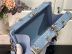 Men's Louis Vuitton trunk bag open top with light blue interior lining and silver clasps