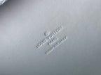 Men's Louis Vuitton bag embossed logo on light blue textured leather