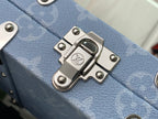 Men's Louis Vuitton trunk bag latch and stud corner detail on light blue leather