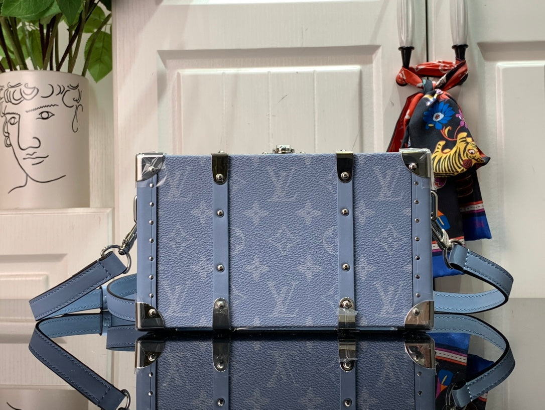 Men's Louis Vuitton trunk bag, light blue monogram with silver studs and shoulder strap