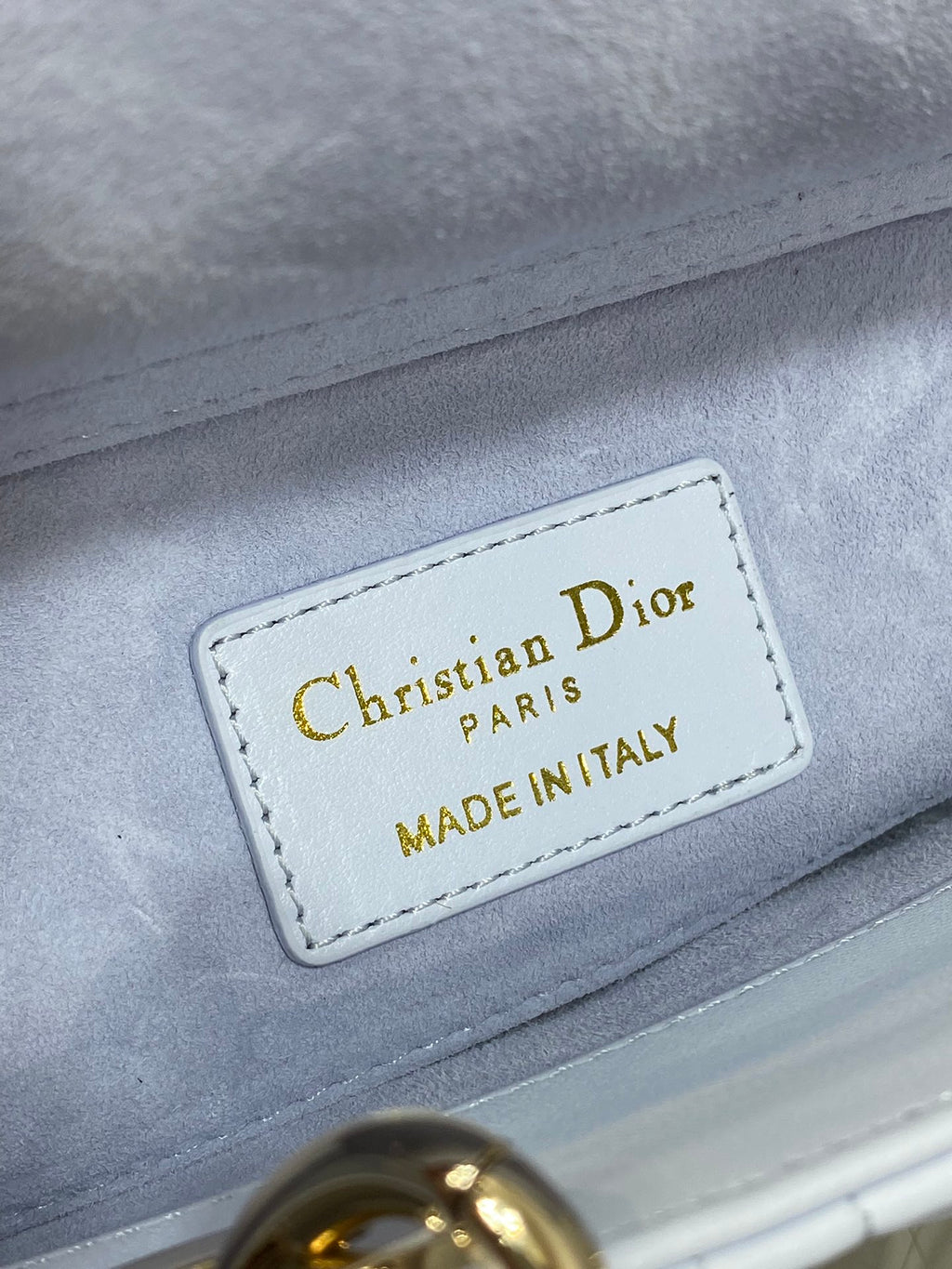 Light blue handbag leather patch: Christian Dior Paris, made in Italy