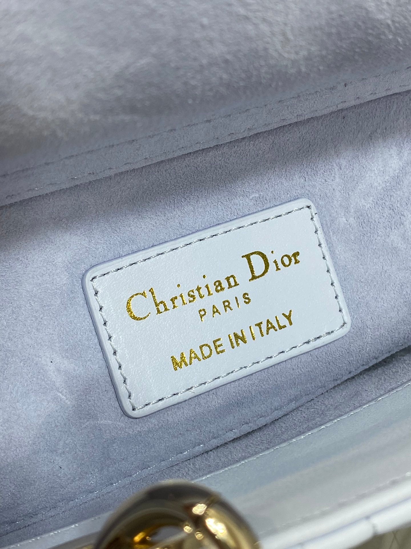 Light blue handbag leather patch: Christian Dior Paris, made in Italy