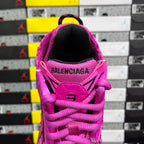 Pink Balenciaga sneaker heel with “BALENCIAGA” branding on the back strap