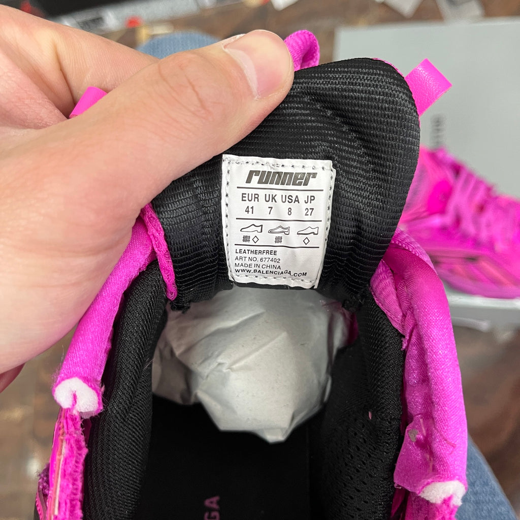 Inside sneaker size label with “runner” and EU 41, black lining with pink laces