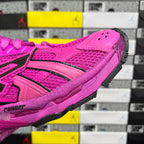 Pink sneaker upper and midsole with black trim, textured mesh, and grippy sidewall
