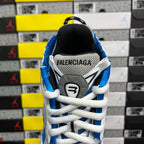 Rear view of Balenciaga sneakers with blue collar and black heel counter detail
