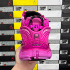 Pink sneaker back with “BALENCIACA” on heel and visible size tag marked 41