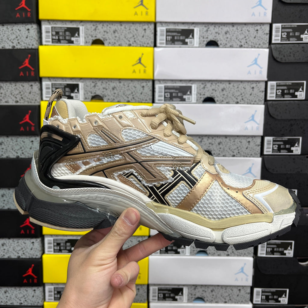 Balenciaga unisex sneakers in light gold and white with black heel and chunky sole