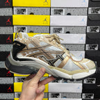 Balenciaga unisex sneakers in light gold and white with black heel and chunky sole