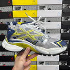 Unisex runner shoes front side view, silver mesh with blue panels and neon yellow-green