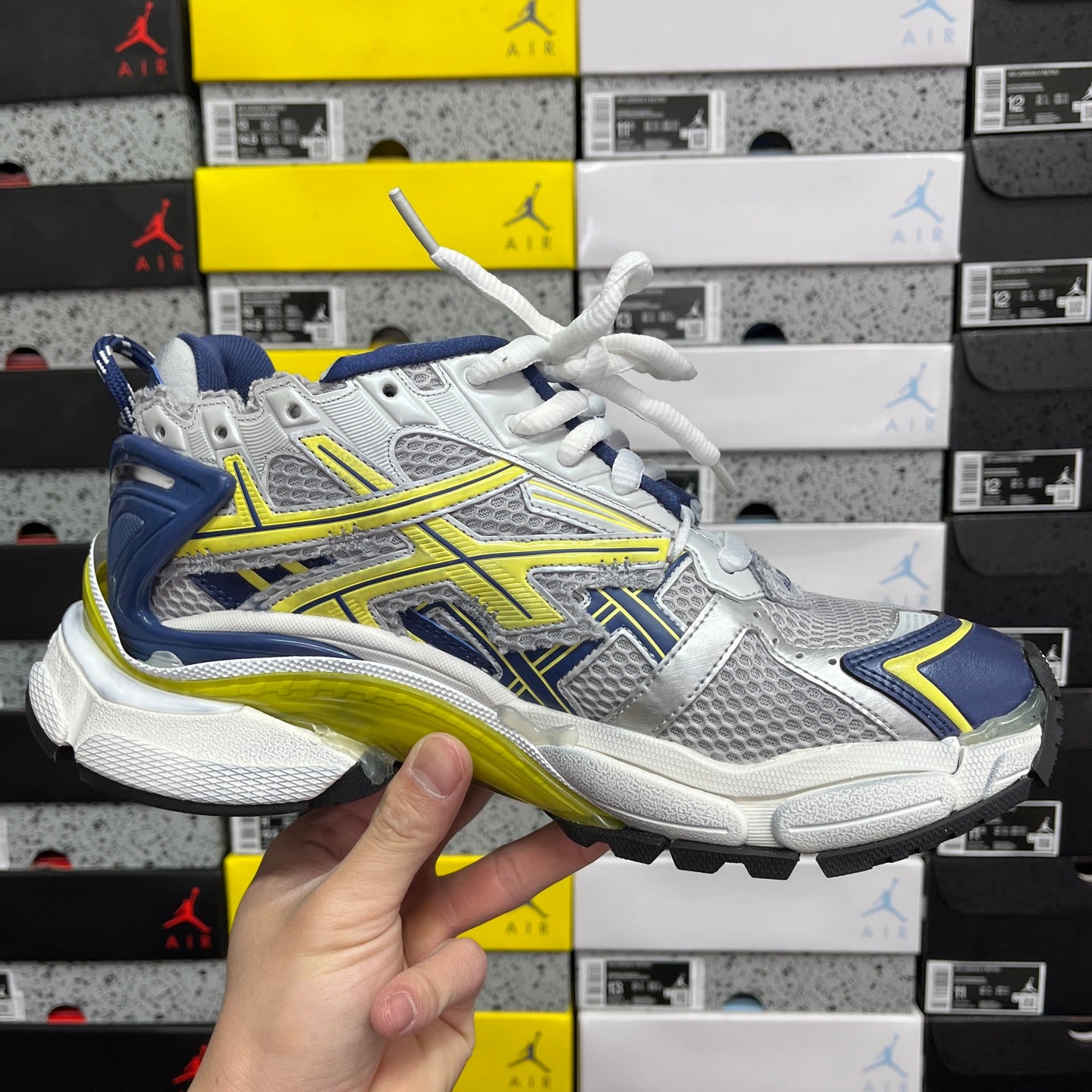 Unisex runner shoes front side view, silver mesh with blue panels and neon yellow-green