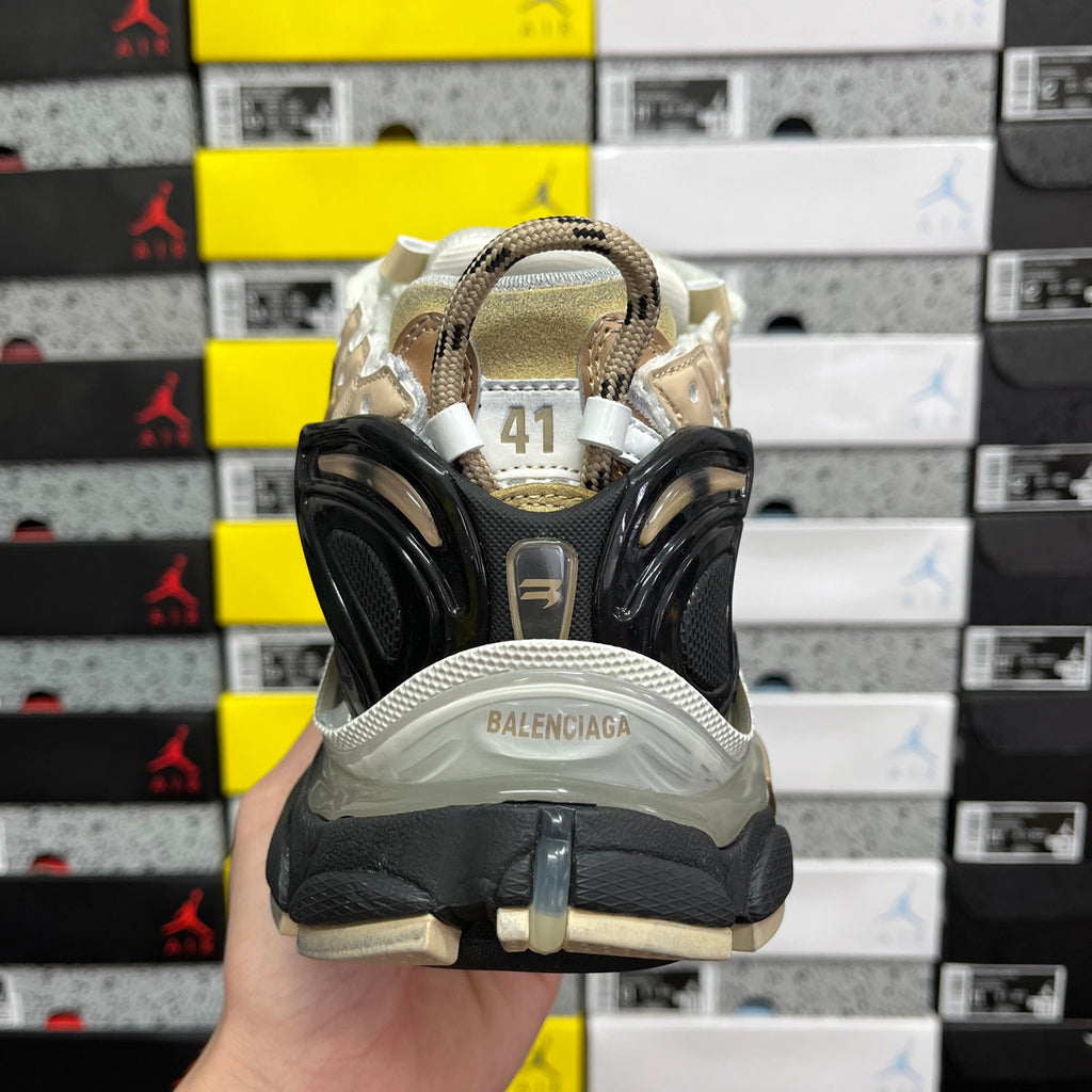 Balenciaga unisex sneakers rear view with BALENCIAGA heel print and black pods