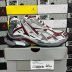 Balenciaga unisex sneakers side view, silver and burgundy panels, white lace-up